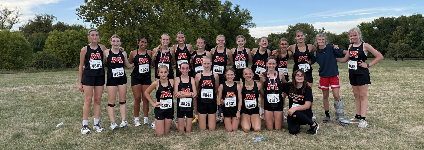 The Moorhead middle school girls cross country team together after winning the 8AAA Preview